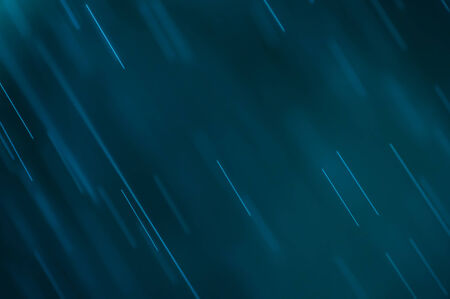abstract blue background, falling water dropsの写真素材