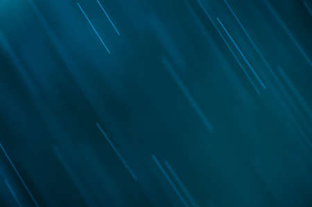 abstract blue background, falling water dropsの写真素材