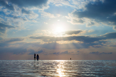 Sunset on the beach with beautiful skyの写真素材