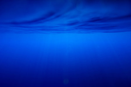 Abstract underwater deep blue backgroundsの写真素材