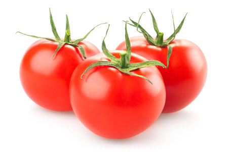 Fresh tomatoes isolated on white backgroundの写真素材