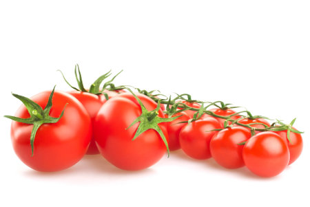 Fresh tomatoes isolated on white backgroundの写真素材