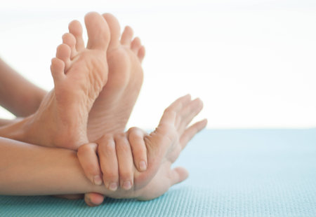 yoga stretching, posture detail close upの写真素材