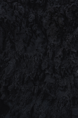 black wall, volcano lava stone textureの写真素材