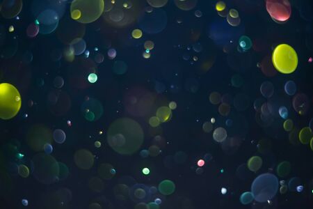 abstract bokeh background, colorful particlesの写真素材