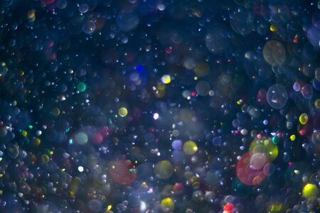 abstract bokeh background, colorful particlesの写真素材