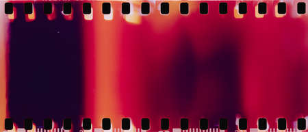 real film strip texture with burn light leaks, abstract backgroundの写真素材