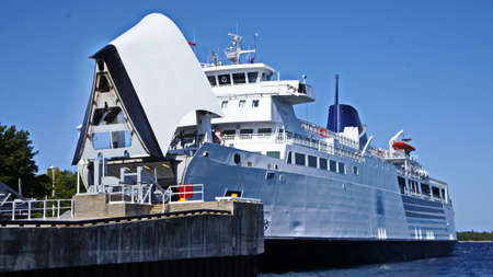 Ferry boat waiting for cargoのeditorial素材