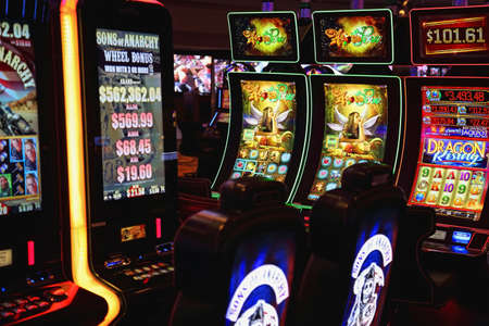 Casino machines in the entertainment area at nightのeditorial素材