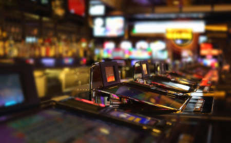 Casino machines in the entertainment area at nightの写真素材