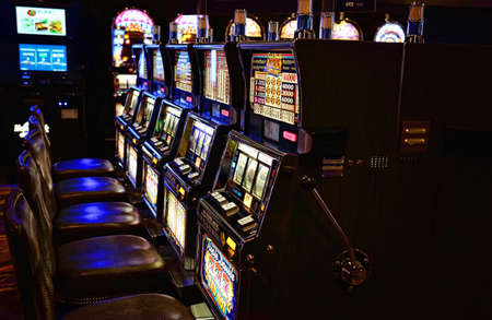 Casino machines in the entertainment area at nightのeditorial素材