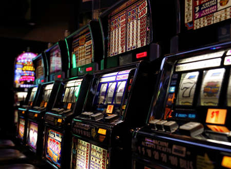 Casino machines in the entertainment area at nightのeditorial素材