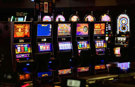 Casino machines in the entertainment area at nightのeditorial素材