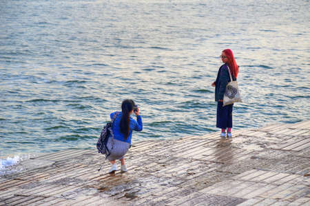 Tourists snapping pictures near Lisbon landmarksのeditorial素材