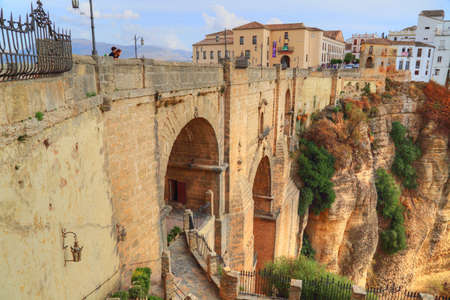 Tourists enjoying view from a scenic Puente Nuevo Arch (Puente Nuevo Bridge)のeditorial素材