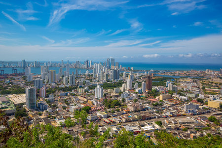 Colombia, scenic view of Cartagena cityscape, modern skyline, hotels and ocean bays Bocagrande and Bocachica from the lookout hill of Santa Cruz convent (Convento de la Popa)の写真素材