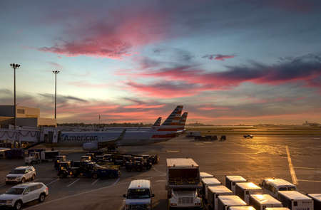 Planes departing from Boston Logan Airport at sunsetのeditorial素材