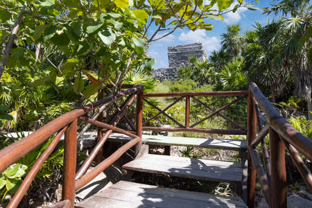 Temple of the God of Wind in Tulum Archaeological Zone with Mayan pyramids and ruins located on the scenic ocean shore of Quintana Roo province.の写真素材