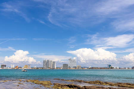 View from Deer Island, Isla de Venados, of famous Mazatlan sea promenade El Malecon, with ocean lookouts, luxury hotels, beaches and scenic landscapes.の写真素材