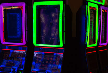 Casino machines in the entertainment area at night.の写真素材