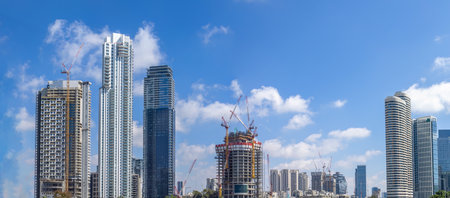 Scenic Tel Aviv financial and business district skyline, construction of new office buildings.の写真素材
