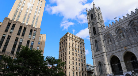 Place dArmes square and Notre-Dame Basilica in Old Montreal historic town near Old Port .の写真素材