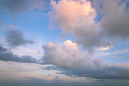 Dramatic sunset skies, cloudscape of rich color twilight sky. Sunset cloud background.の写真素材