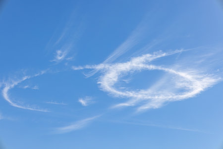 Scenic dramatic summer clouds. Cloudscape of bright blue sky. Cloud backgroundの写真素材