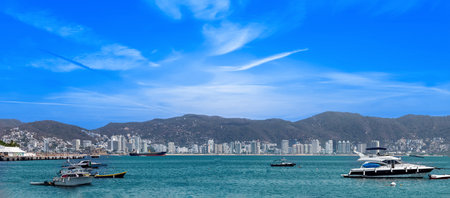 Mexico, Acapulco marina bay and tourists boats waiting to start excursions .の写真素材