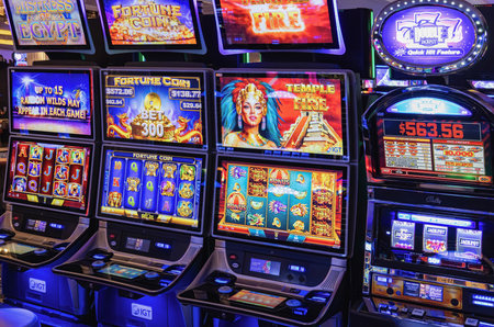 Las Vegas, USA, 2 May, 2025: Casino gambling blackjack and slot machines waiting for gamblers and tourist to spend money.の写真素材
