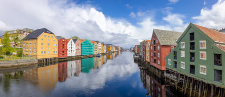 Norway, scenic Trondheim town. Bakklandet, a famous tourist travel destination with colorful housesの写真素材