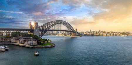 Australia, Sydney bridge and skyline panorama near financial business center.の写真素材