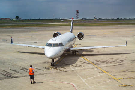 Airplane taxiing down the runwayのeditorial素材