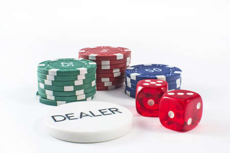 A selection of poker chips with dealerの写真素材