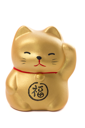 Golden Japanese  lucky cat  isolated on white backgroundの写真素材