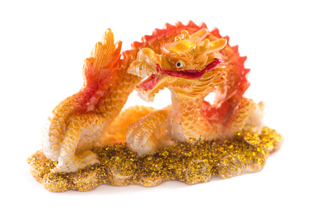 feng shui golden chinese dragon of the lucky charm sculpture isolated on white backgroundの写真素材