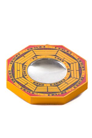 feng shui mirror wood pakua isolated on pure white backgroundの写真素材