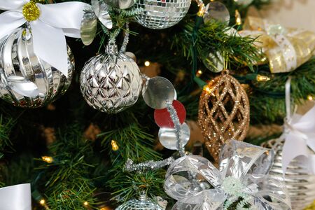 silver and white Christmas and New Year tree decorationsの写真素材