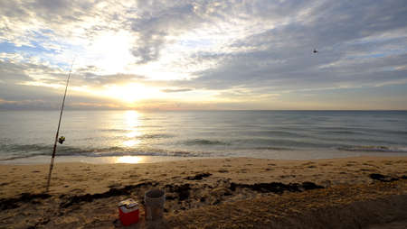 Fishing at the seashoreの写真素材