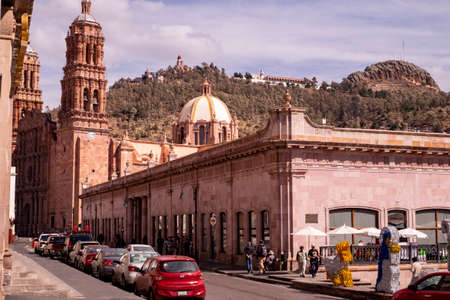 Zacatecas, Mexico, December 21st, 2017: street view of the colonial town with the cathedral unesco heritageのeditorial素材