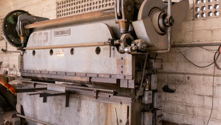 La Paz, Mexico - December, 15th ,2017: Old mechanical press brake industrial equipmentのeditorial素材