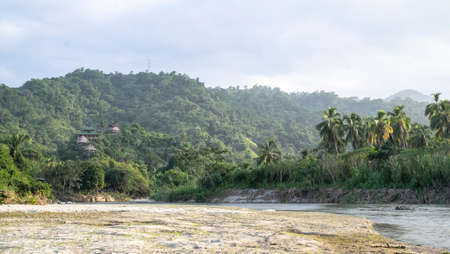 San Martin, Colombia - December, 15th, 2018: river view and bungalow just on the limits of Tayrona National Parkのeditorial素材