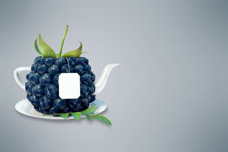Blackberry tea cup. Healthy food. Blackberry drinkの写真素材