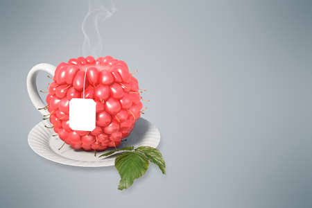Raspberry tea cup. Healthy food. Raspberry drinkの写真素材