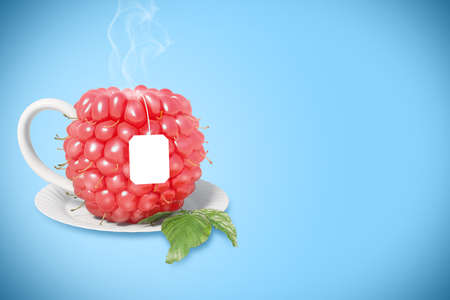 Raspberry tea cup. Healthy food. Raspberry drinkの写真素材