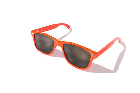 Red sun glasses isolated over the white backgroundの写真素材