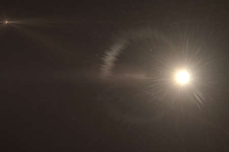 Lens flare effect in space 3D renderの写真素材