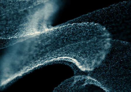 Blue bokeh texture on black backgroundの写真素材