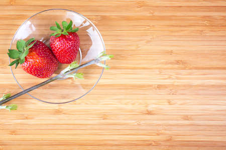 fresh strawberries on wooden tableの写真素材