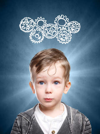 Smart child thinks of looking at gears